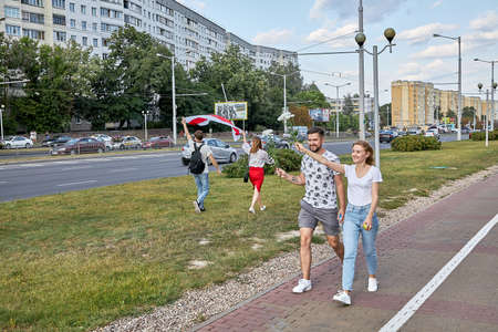 August 15 2020 Minsk Belarus Many people stand by the roadside to protest against violenceのeditorial素材
