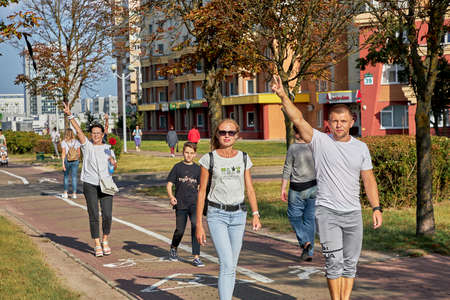 August 15 2020 Minsk Belarus Many people stand by the roadside to protest against violenceのeditorial素材