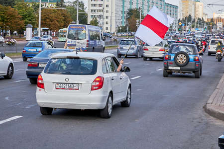 August 15 2020 Minsk Belarus A car with an opposition flag and a stop dictator posterのeditorial素材