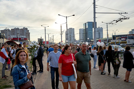 August 14 2020 Minsk Belarus Many people stand by the roadside to protest against violenceのeditorial素材