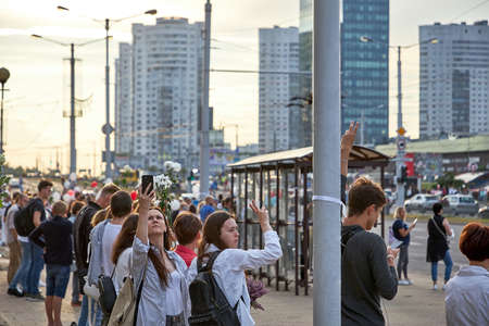 August 14 2020 Minsk Belarus Many people stand by the roadside to protest against violenceのeditorial素材