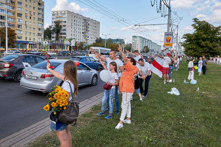 August 15 2020 Minsk Belarus Many people stand by the roadside to protest against violenceのeditorial素材