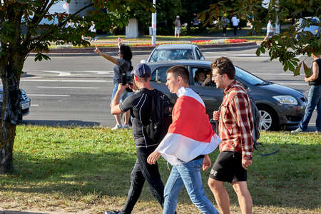 August 15 2020 Minsk Belarus Many people stand by the roadside to protest against violenceのeditorial素材