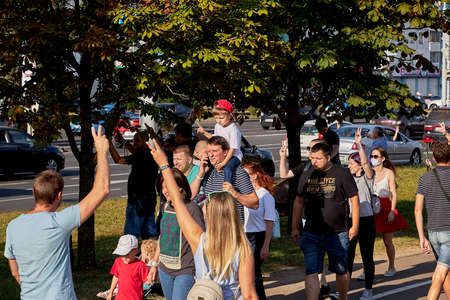 August 15 2020 Minsk Belarus Many people stand by the roadside to protest against violenceのeditorial素材