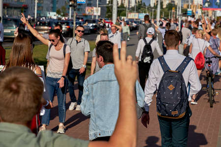 August 15 2020 Minsk Belarus Many people stand by the roadside to protest against violenceのeditorial素材
