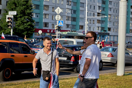 August 15 2020 Minsk Belarus Many people stand by the roadside to protest against violenceのeditorial素材