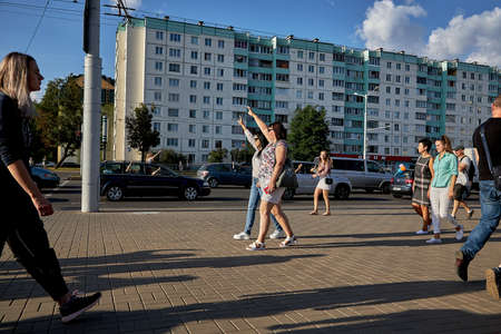 August 15 2020 Minsk Belarus Many people stand by the roadside to protest against violenceのeditorial素材