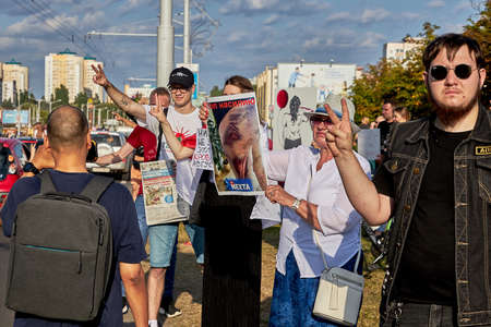 August 15 2020 Minsk Belarus Many people stand by the roadside to protest against violenceのeditorial素材