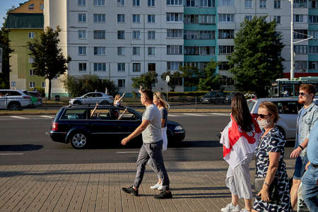 August 15 2020 Minsk Belarus Many people stand by the roadside to protest against violenceのeditorial素材