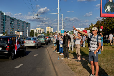 August 15 2020 Minsk Belarus Many people stand by the roadside to protest against violenceのeditorial素材
