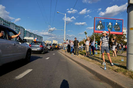August 15 2020 Minsk Belarus Many people stand by the roadside to protest against violenceのeditorial素材