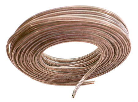 Front view of coiled audio cable without packaging isolated on whiteの写真素材
