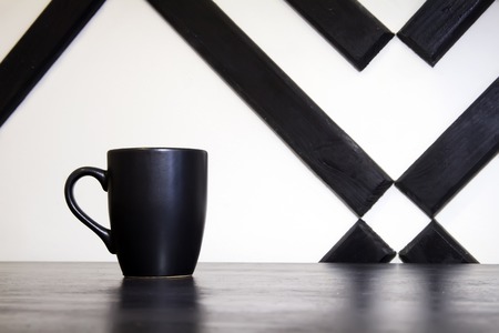 cup of coffee on the table in the interiorの写真素材