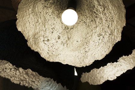 light bulb and lamp in modern style. Warm tone light bulb lamp. Lamps in coffee shop. lightbulb in interior.の写真素材