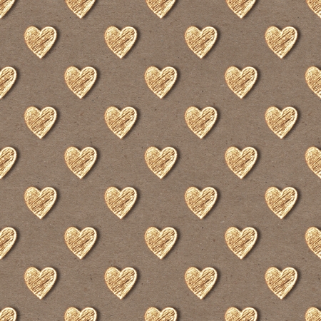 Golden hearts seamless pattern. Gold glitter on old paper backgroundの写真素材
