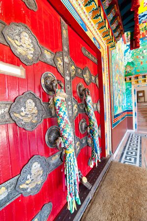 Embroidered main gate of Kopan Monastery temple in Kathmandu Nepの写真素材