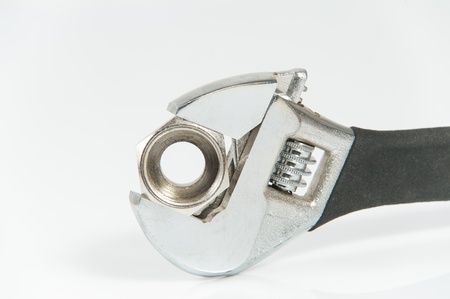 isolated vertical wrench jaws with union nut on white backgroundの写真素材