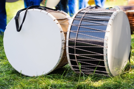 Outdoor festival drums on the grassの写真素材