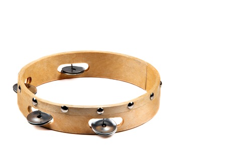 Isolated image of wooden tambourine on white background の写真素材