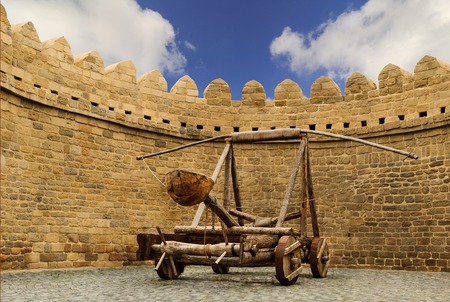 catapult wooden Turkish Mancinik in city wall Icheri Sheher (Old Town) of Baku Azerbaijanの写真素材