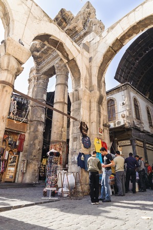 DAMASCUS, SYRIA - NOVEMBER 16, 2012: Ordinary day at Al-Hamidiyah Souq in the old city of Damascus. Bazaar is the largest souk in Syria.The souq starts at Al-Thawra street and ends at Umayyad Mosqueのeditorial素材