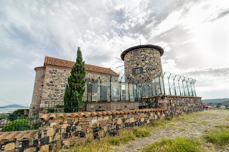 BALIKESIR, TURKEY - MAY 21 2016:Library of Sevim and Necdet Kent.Windmill and church were restored with the financial support of Rahmi Koc thereby saving monuments to cultural heritage for posterityのeditorial素材