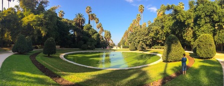 ALGIERS, ALGERIA - SEP 24, 2016:Big pool and trees in Botanical Garden of Hamma in Algiers.It was established in 1832 and now still considered one of the most important botanical gardens in the worldのeditorial素材