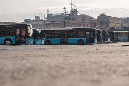 Eminonu, Istanbul, Turkey - 02.18.2021: low angle of bus depot of Eminonu and waiting buses for departure time to move with copy spaceのeditorial素材