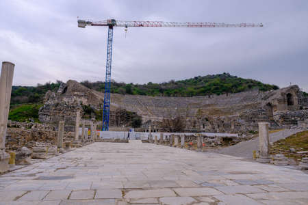 Selcuk, Izmir, Turkey - 03.09.2021: restoration and renovation works going on in the Theatre of Ephesus ruins, historical ancient Roman archaeological sites in eastern Mediterranean Ionia regionのeditorial素材