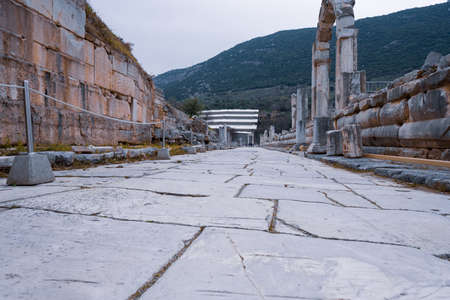 Selcuk, Izmir, Turkey - 03.09.2021: historical Arcadiane Road made by colonnaded marble wide angle connecting the theatre and the former harbor in Ephesus ruins, historical ancient Roman archaeological sites in eastern Mediterranean Ionia regionのeditorial素材