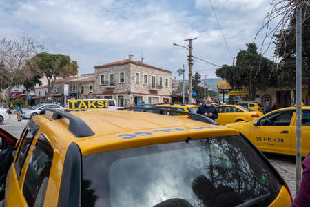Seferihisar, Izmir, Turkey - 03.09.2021: Turkish Taxicab stand and a lot of waiting taxi cars and a...