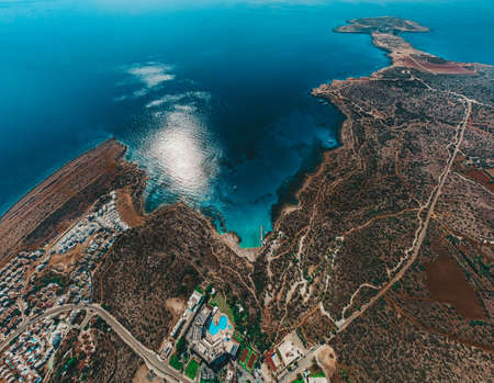 Drone aerial view of Konnos Beach in Cyprus island from a birds eye. Picturesque view of Mediterranean Sea. High quality photoの写真素材