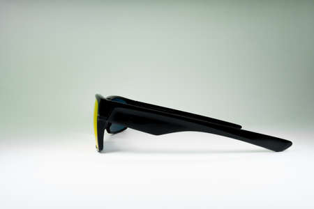 Product photo of sun Glasses with blue glass and black frame on white background. Template for social media, websiteの写真素材