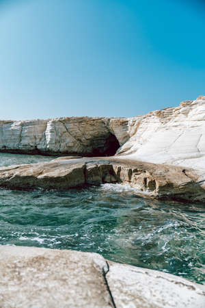 landscape of White stones cave cliff rocks in Limassol Cyprus with blue sea, bright and clean
