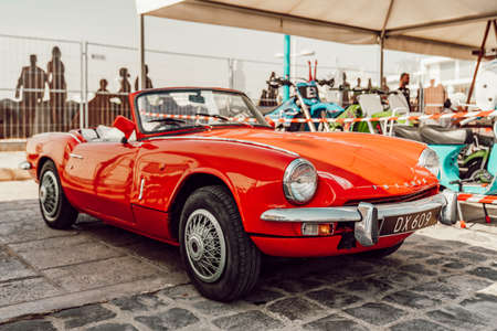 triumph red old retro vintage convertible carの写真素材