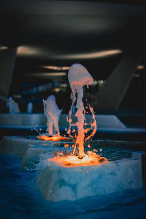 close up shot of city fountain with blue and orange lights, Cyprusの写真素材