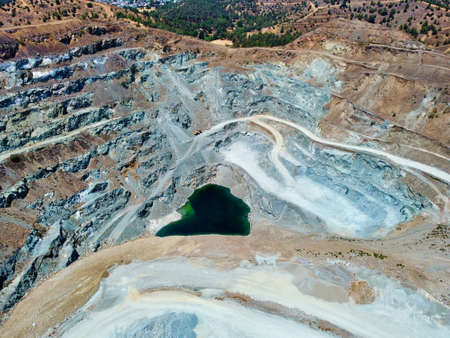 drone aerial photo of flooded mosfiloti quarries in Cyprus, green lakes near copper mine, quarryの写真素材