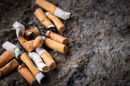 World No Tobacco Day.Cigarette butts on a gray background / cigarette butts / cigarette