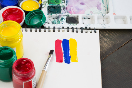 watercolor paint tray with brushの写真素材