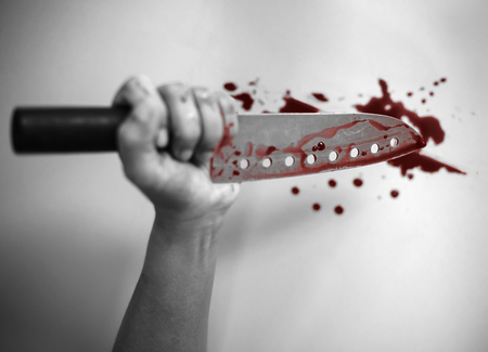 hand holding the Bloody knife