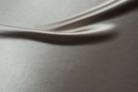 Luxury smooth elegant gray matalic color silk fabric texture as background Abstract backgroundの写真素材