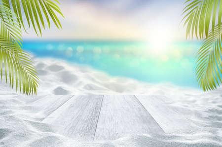 Top of white wood table and white sand dunes with blurred sea and palm leaves as frame beach in summer Conceptの写真素材