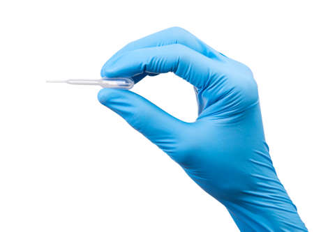 Scientist wears blue rubber gloves hands holding transparent plastic laboratory pipette or dropper...