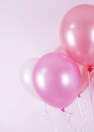 Colorful balloons background, Many blown balloons on wall, Bunch of balloons isolated on backgroundの写真素材