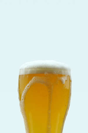 Full beer glass, A glass of cold beer macro photography, cool beer objectの写真素材