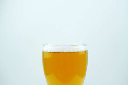 Full beer glass, A glass of cold beer macro photography, cool beer objectの写真素材