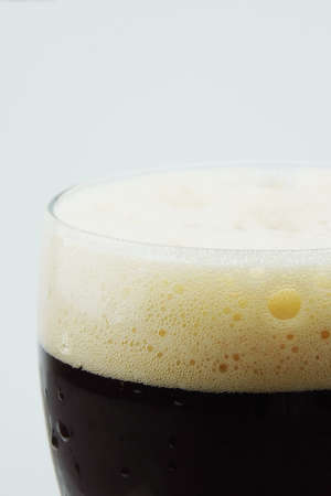 Full beer glass, A glass of cold beer macro photography, cool beer objectの写真素材