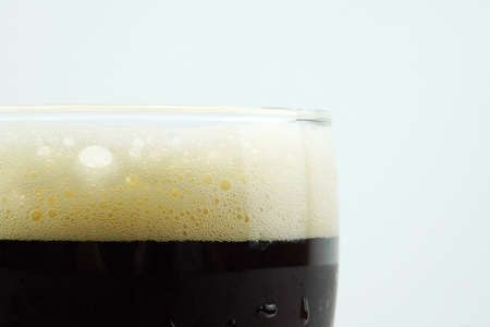 Full beer glass, A glass of cold beer macro photography, cool beer objectの写真素材