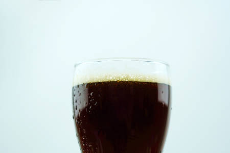 Full beer glass, A glass of cold beer macro photography, cool beer objectの写真素材