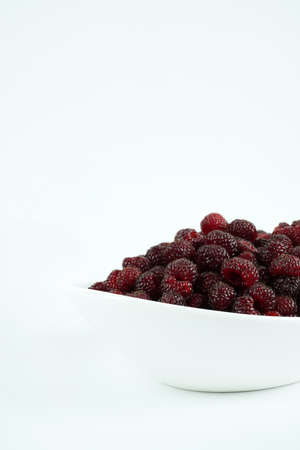 Fresh raspberry, Delicious raspberry isolated on color backgroundの写真素材